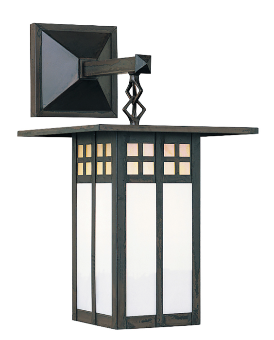 A modern outdoor wall sconce with a dark weathered metal frame, featuring a rectangular backplate, a decorative central support, and a tiered shade. The front has vertical panels with white frosted glass inserts and small square glass accents near the top, shown against a plain white background.
