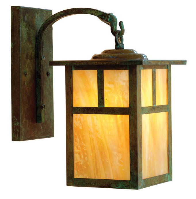 A rectangular outdoor wall sconce with a dark bronze metal frame and warm yellow-orange illuminated glass panels, shown against a plain white background.