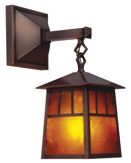 A modern outdoor wall sconce with a dark bronze-finished metal frame and warm amber-orange textured glass panels, shown against a plain white background.