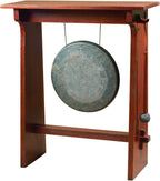 Gong on a wooden stand.
