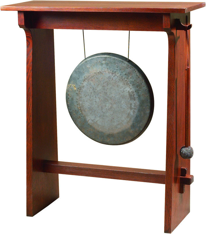 Gong on a wooden stand.