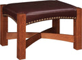 Wooden stool with brown leather seat on a white background