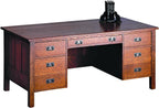 Wooden desk with multiple drawers.