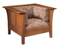 Wooden armchair with patterned cushions on a white background