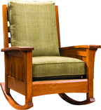 Wooden rocking chair with green cushion on a white background