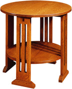 Wooden side table with a round top and shelf on a white background