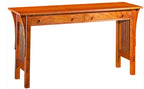 Wooden sofa table with two drawers and spindle legs. 