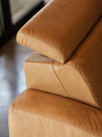Close-up of the Stressless Anna adjustable headrest in Paloma Taupe leather