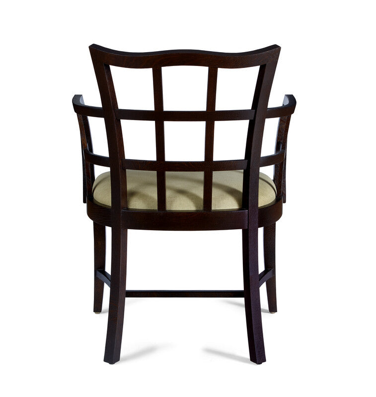 Wooden chair with a beige cushion on a white background