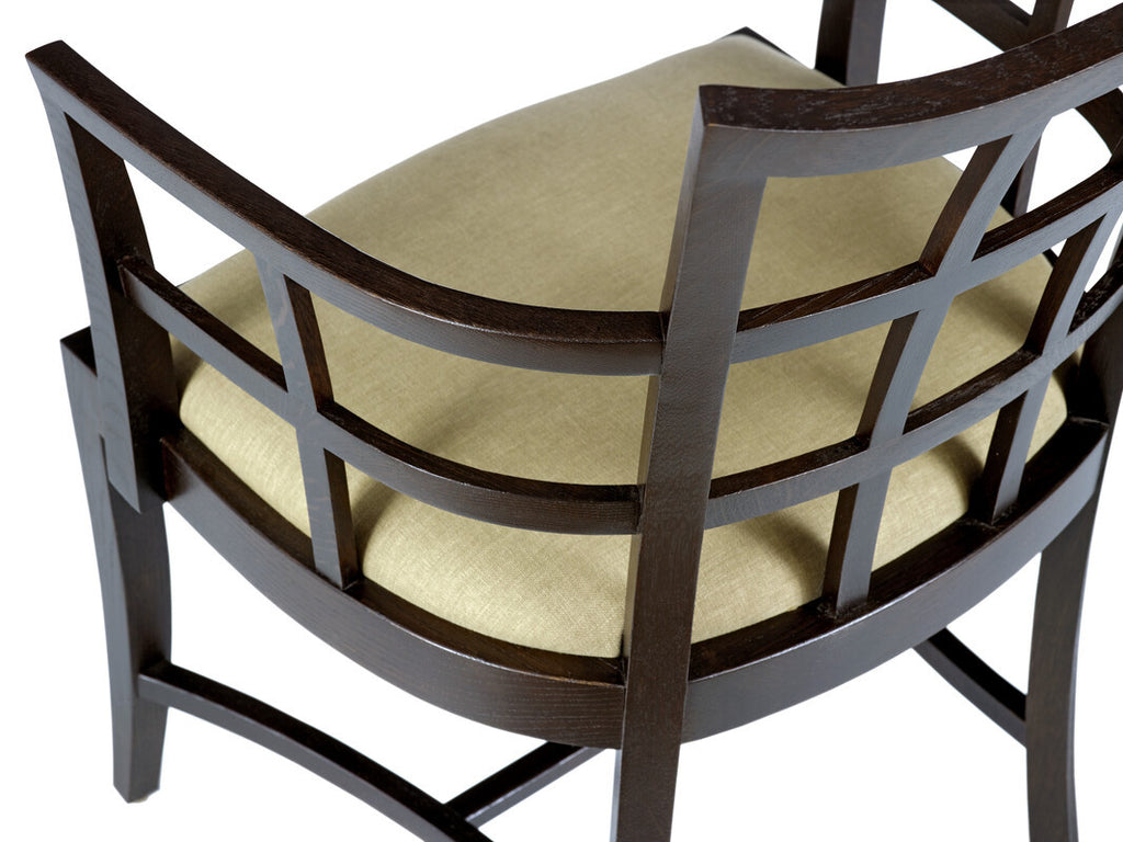 Chair with wooden frame and beige cushion on a white background
