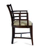 Wooden chair with a cream cushion on a white background