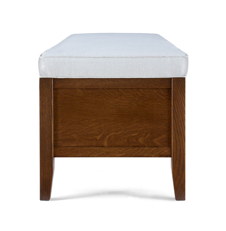 Wooden stool with a white cushion on a white background
