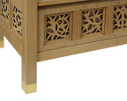 Wooden cabinet with decorative carvings on a white background