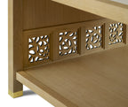 Wooden shelf with decorative cut-out patterns on a white background