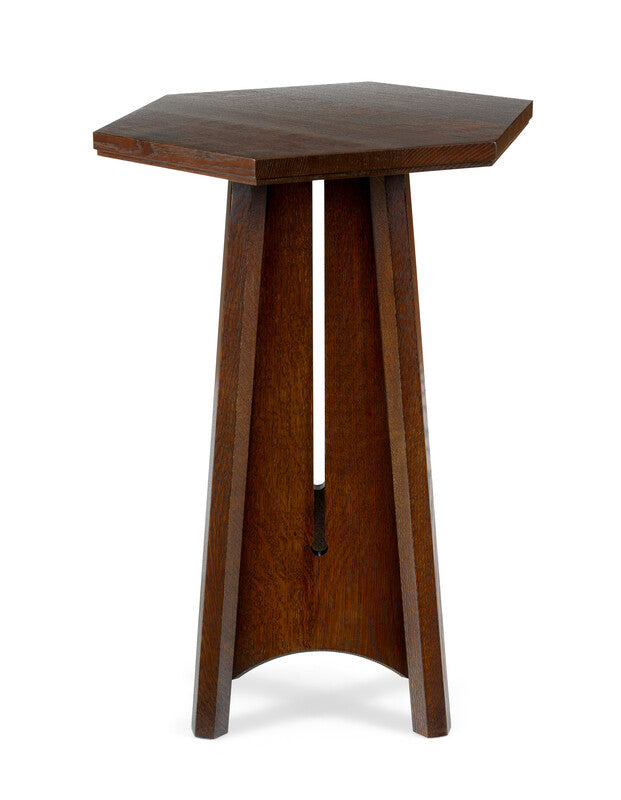 Wooden hexagonal side table on a white background