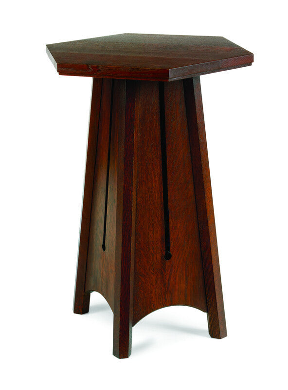 Hexagonal wooden table on a white background