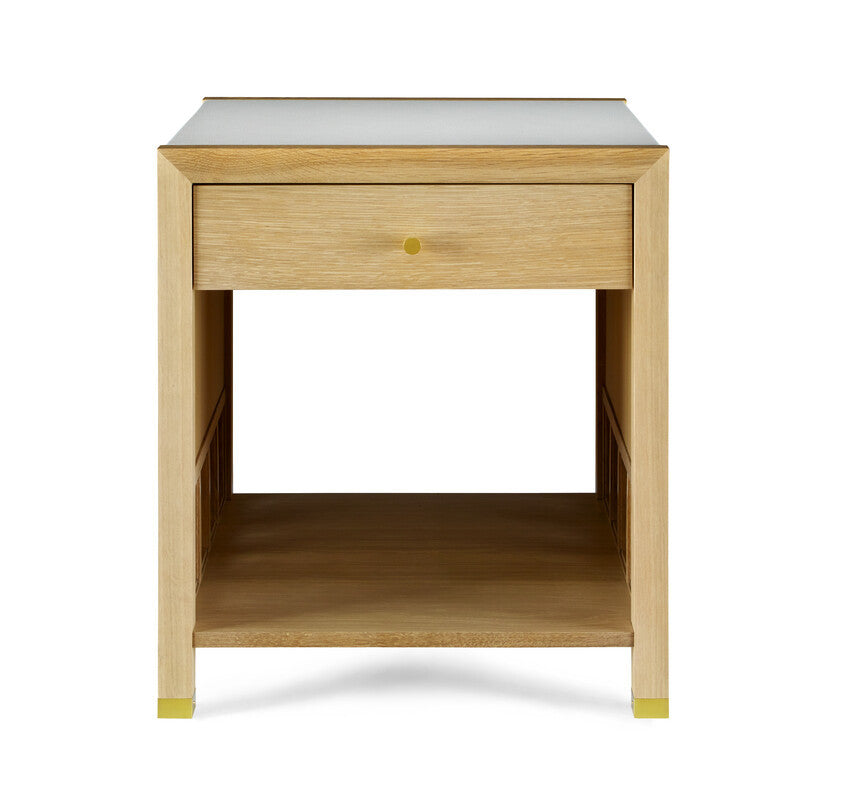 Wooden side table with a drawer and white top on a white background