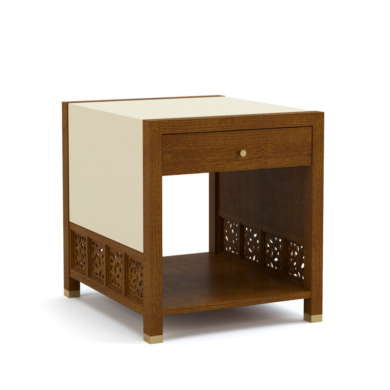 Wooden side table with a drawer and decorative cut-out design on a white background