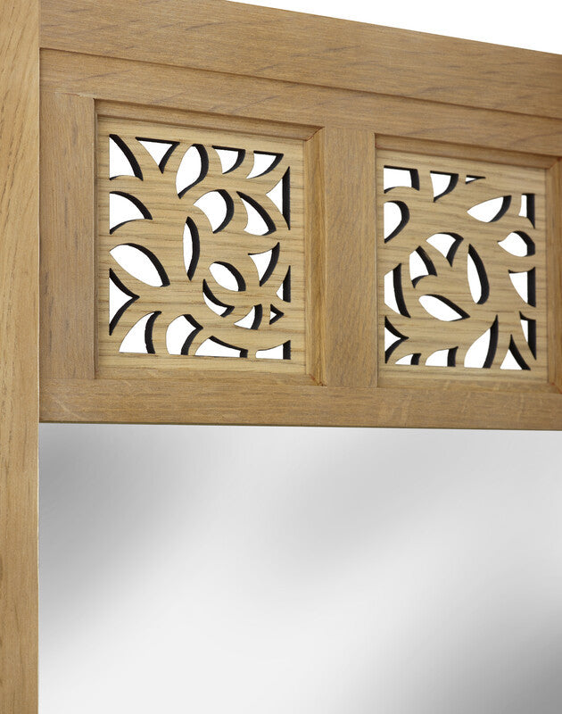 Wooden headboard with decorative cut-out patterns on a white background