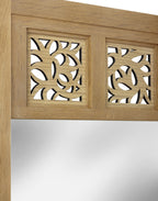 Wooden headboard with decorative cut-out patterns on a white background