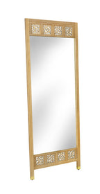 Full-length mirror with decorative beige frame on a white background