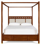 Wooden four-poster bed with white bedding on a white background