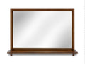 Wooden-framed mirror on a white background
