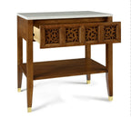 Wooden side table with marble top and decorative carvings on a white background