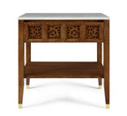 Wooden side table with decorative carvings and a white marble top on a white background