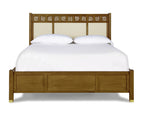 Wooden bed with decorative headboard on a white background