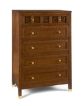 Wooden dresser with decorative carvings on a white background