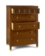 Wooden dresser with decorative carvings on a white background