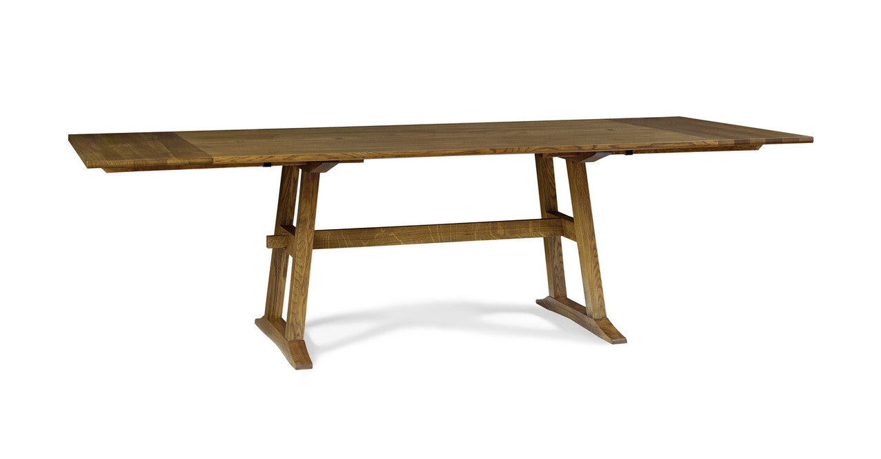 Wooden dining table on a white background