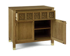 Wooden sideboard with open doors on a white background
