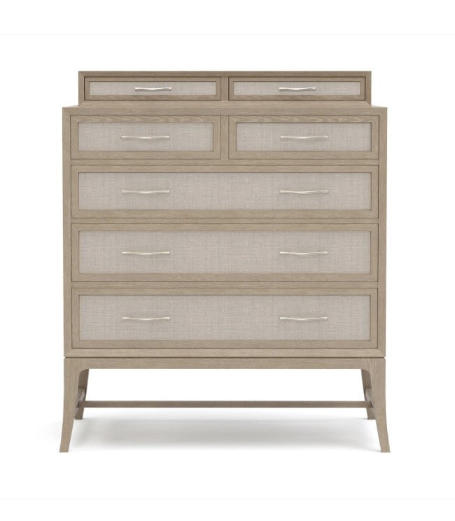 Beige dresser with glass-fronted drawers on a white background