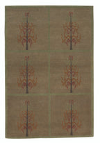 Rug with decorative tree pattern on a brown background