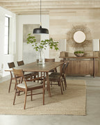 Stickley Walnut Grove Side Chair around a table in a dining room. 
