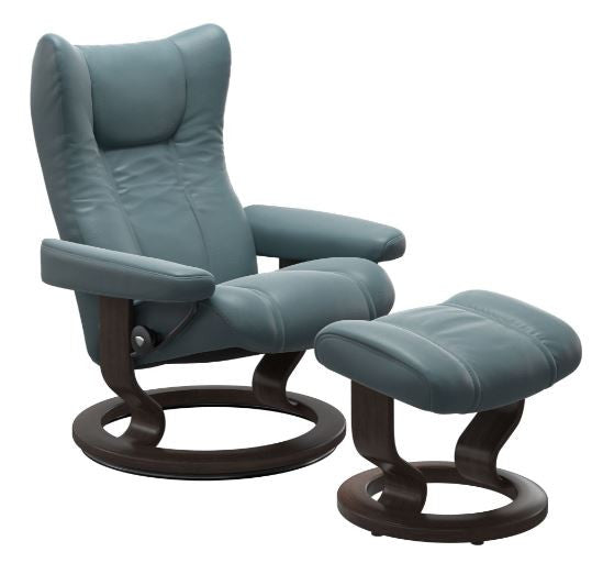 Blue recliner chair with ottoman on a white background