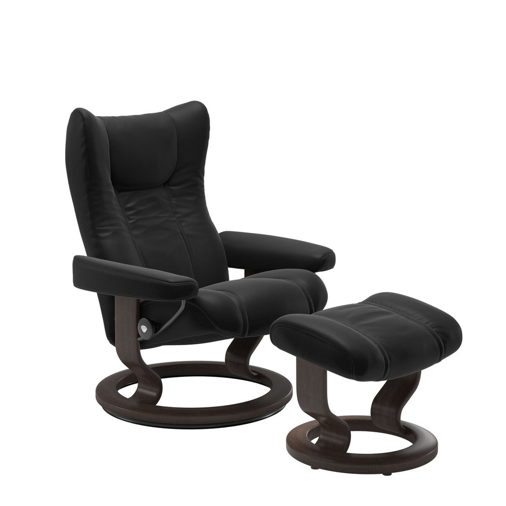 Black recliner chair with ottoman on a white background