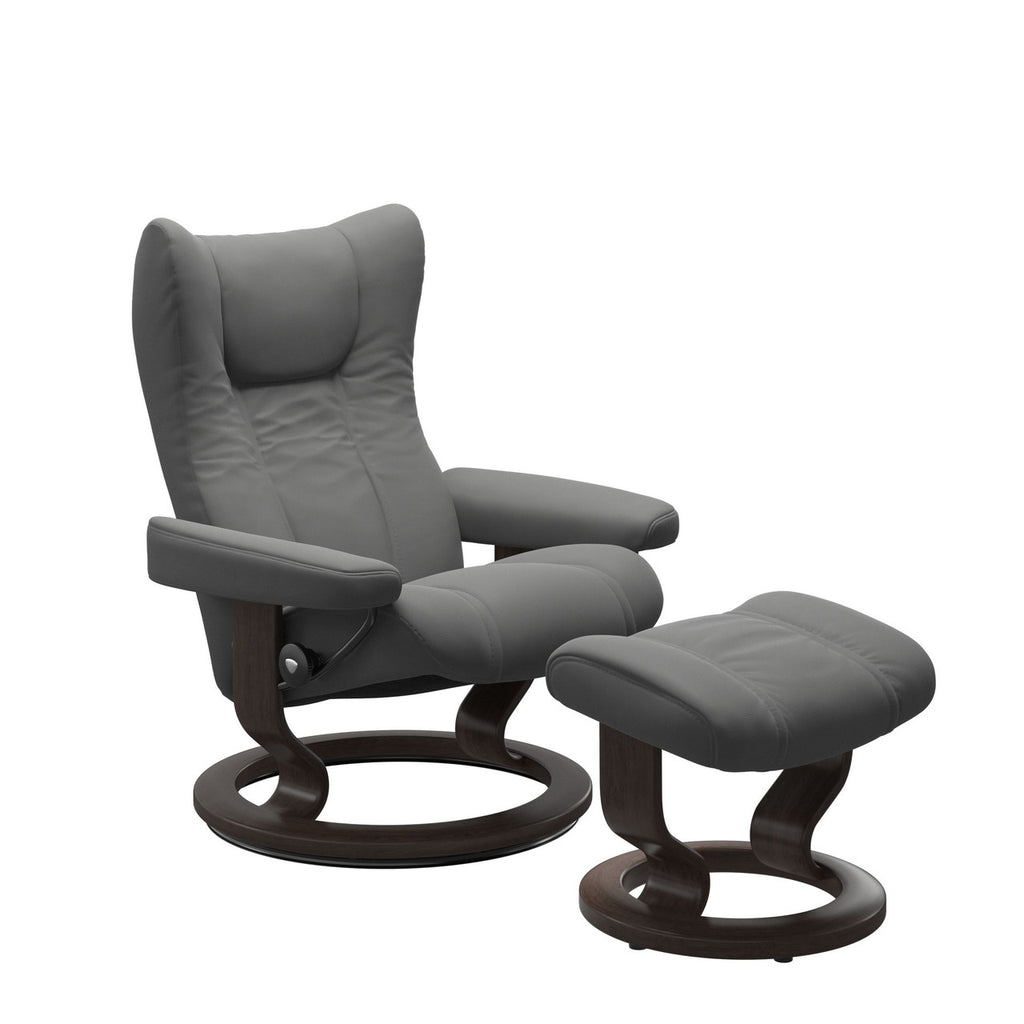 Blue recliner chair with ottoman on a white background
