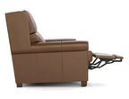 A brown leather recliner chair shown from the side with the footrest extended, photographed on a clean white background.