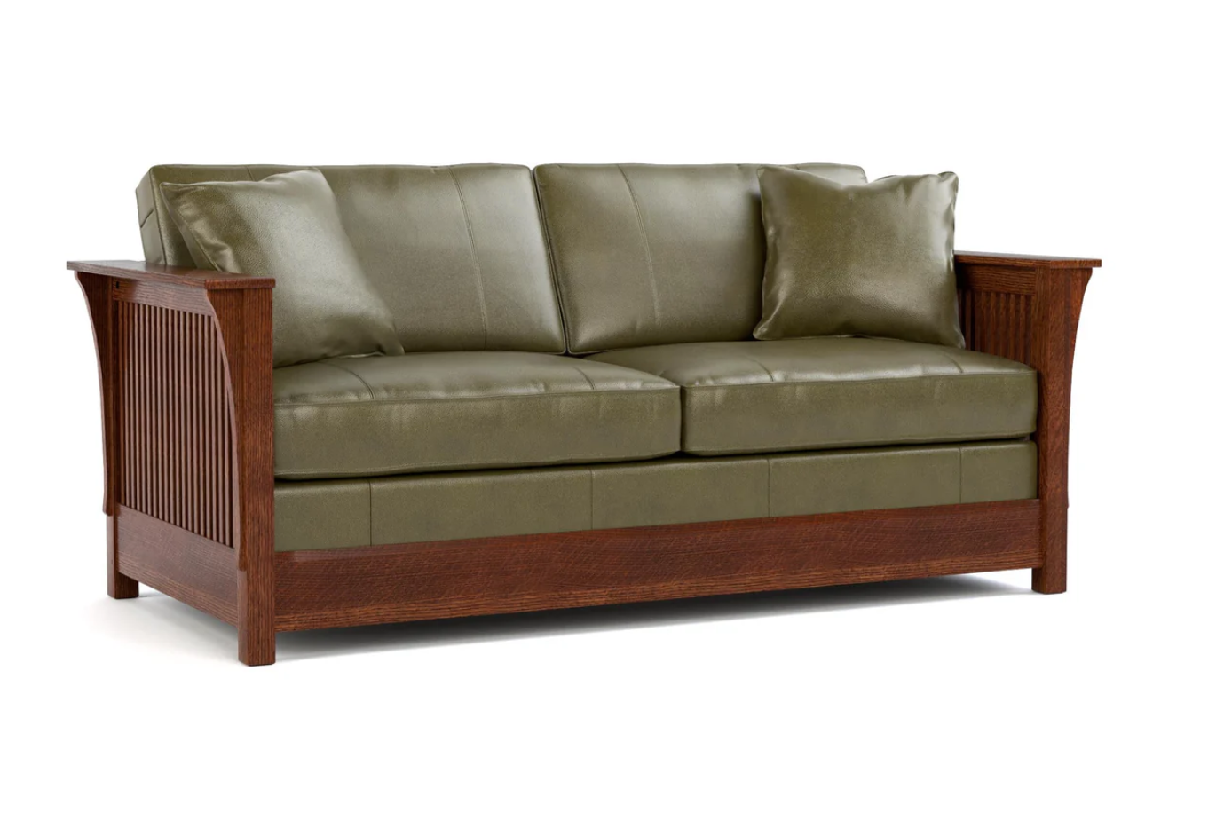 Sleeper sofa in green leather. 