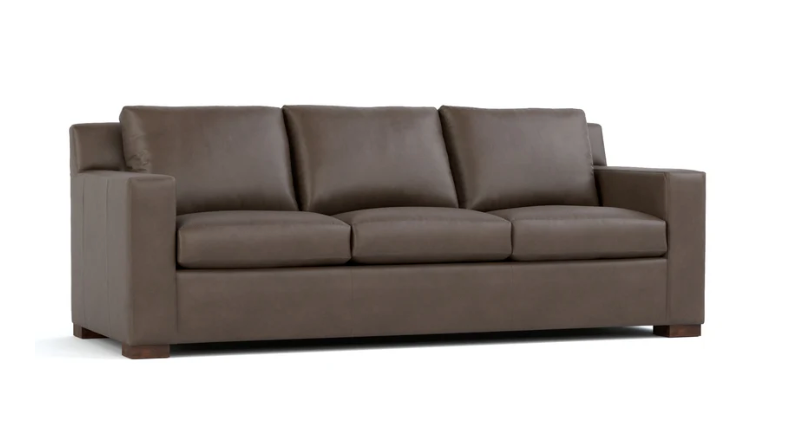 A three-seater sofa upholstered in dark brown leather, shown from a front three-quarter angle against a plain white background.