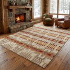 Cream geometric rug in a warm cabin with a stone fireplace