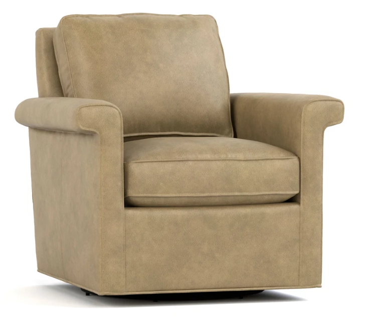A beige upholstered armchair with a high back, wide armrests, and a cushioned seat, shown on a plain white background.