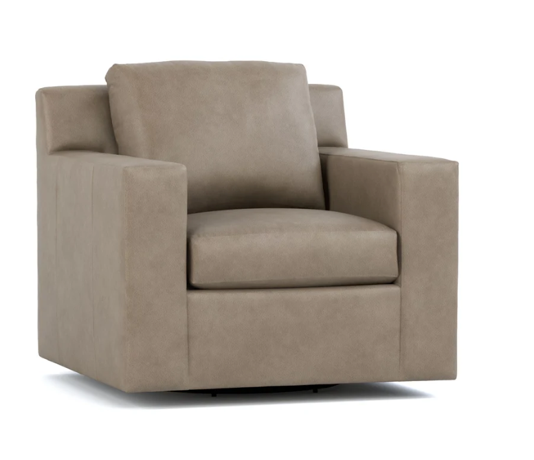 A modern low-profile swivel armchair upholstered in a textured taupe fabric, shown from a three-quarter angle on a white background.