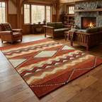 Rust-and-cream rug in a cozy Craftsman cabin with a stone fireplace