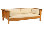 Wooden sofa with beige cushions on a white background