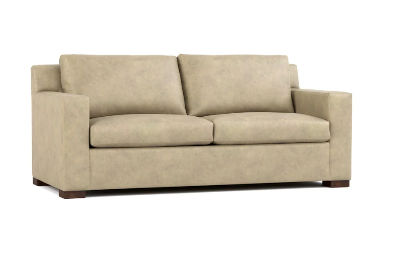 A two-seater loveseat sofa upholstered in a textured beige fabric, featuring dark brown wooden feet, shown against a plain white background.
