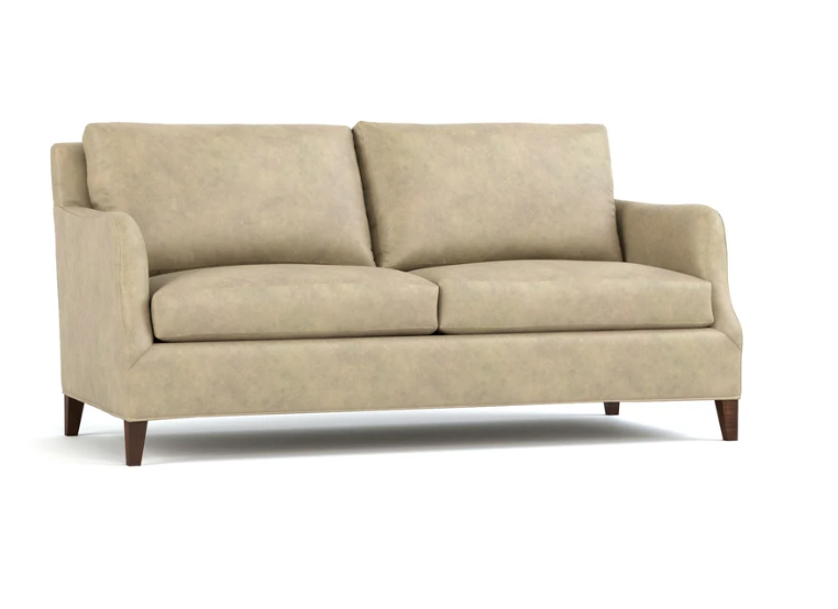 A two-seater loveseat sofa upholstered in a textured beige fabric, featuring dark brown wooden legs, shown against a plain white background.